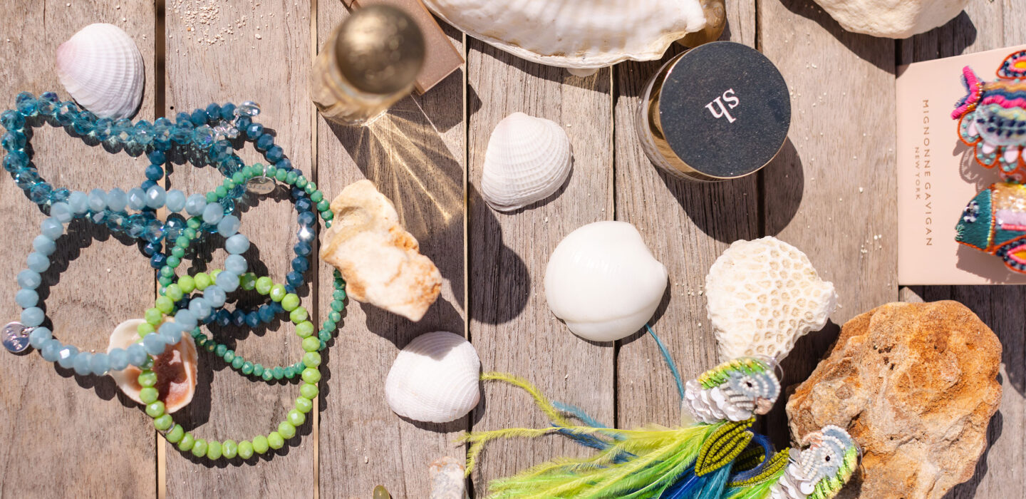 assortment of seashells and jewelry