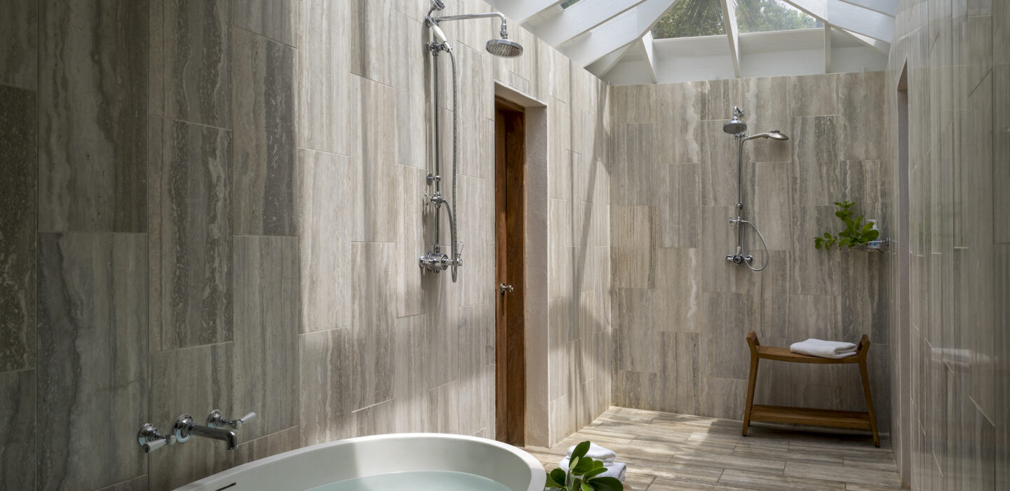 Spacious bathroom with rainforest shower heads at our Bahamas resort