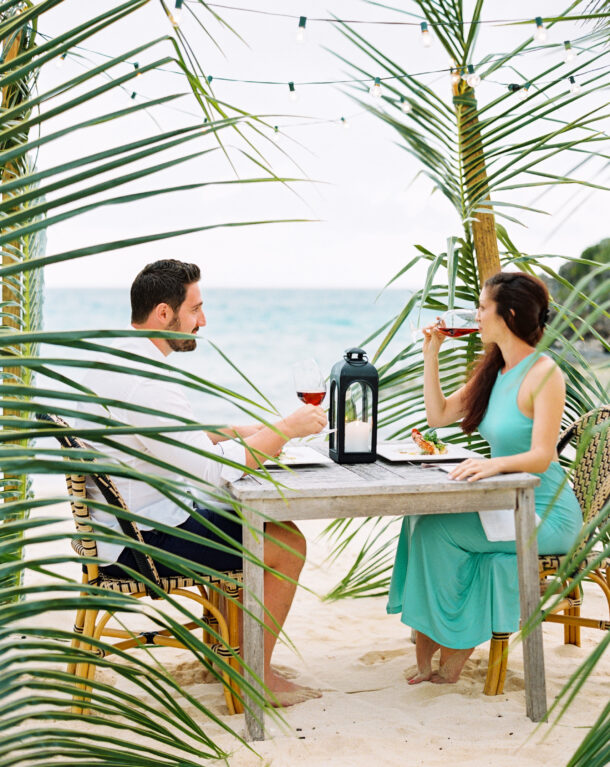 Couple dining on the beach