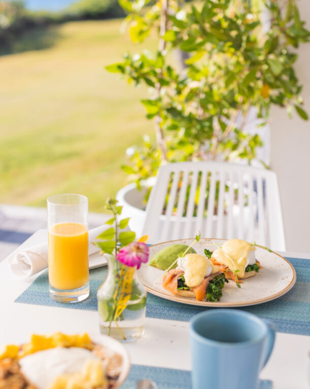 outdoor dining table with breakfast foods